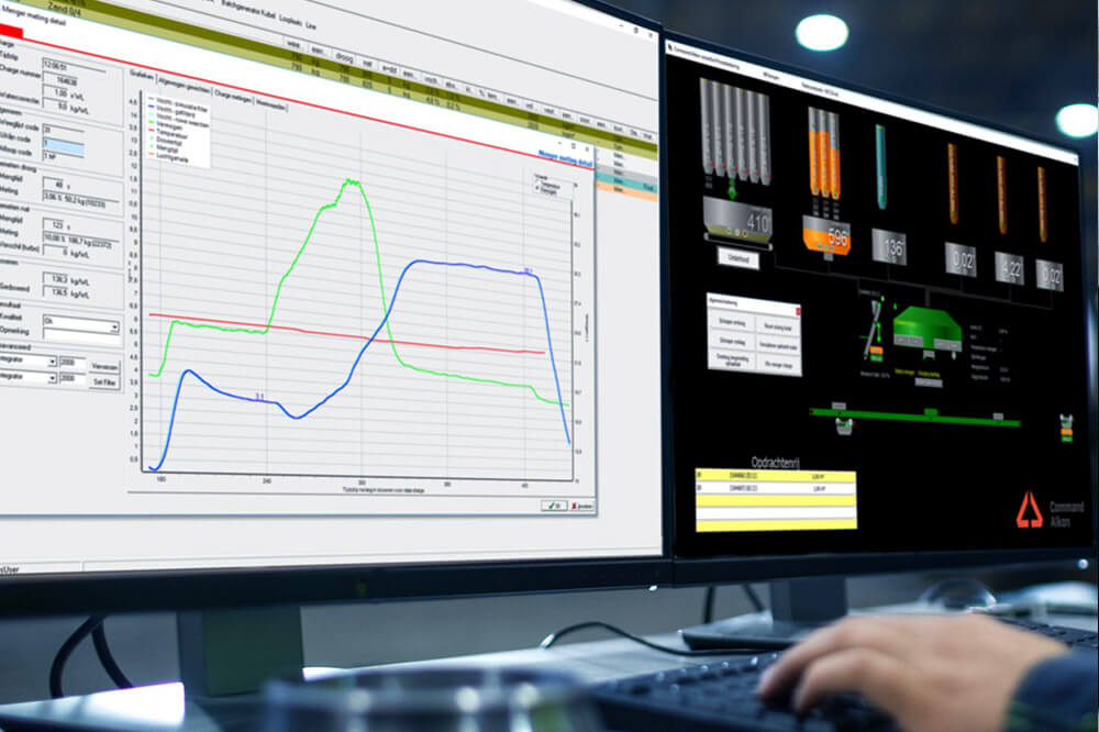 Conactive_PRocess_control man sitting at desktop computer using apex